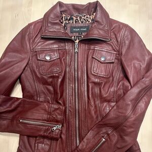 Black Rivet leather jacket.